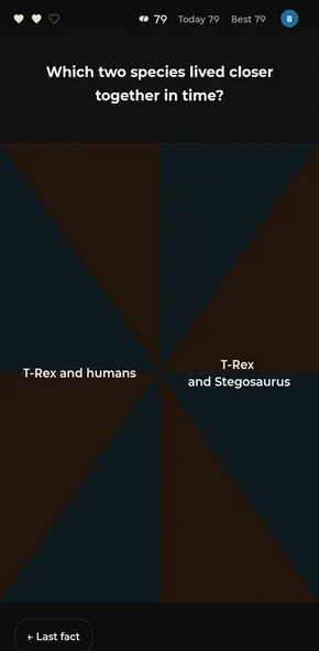 Educated Guess app question screen: “Which two species lived closer together in time?” with the answers “T-Rex and humans” and “T-Rex and Stegosaurus” on a blue and orange pinwheel. The top bar shows two of three hearts, a streak of 79, Today 79 and Best 79.